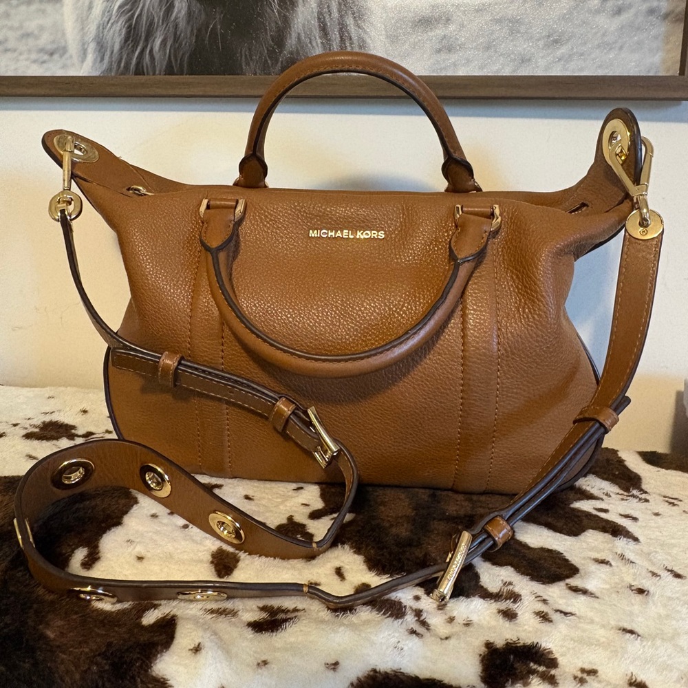 Michael Kors Raven Large Pebbled Leather Satchel in brown with a crossbody strap